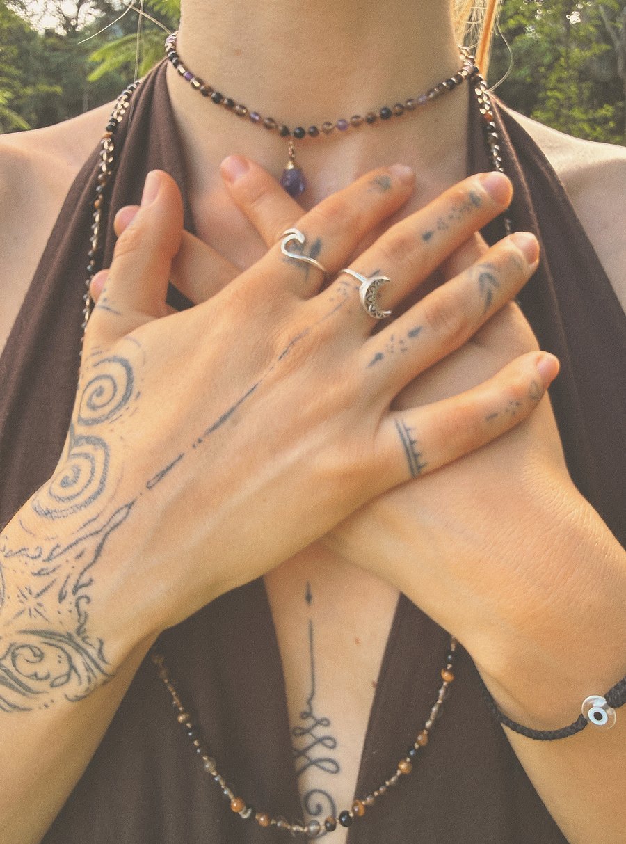 Skye with both hands crossed over her heart.